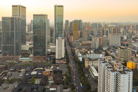 Chengdu, Sichuan Province, China - Nov 19, 2015: Skyline at dusk with IFS buildings and TaiKooLi in the foregroundのeditorial素材
