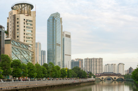 Chengdu, Sichuan Province, China - Aug 19, 2015: Anshun bridge on Jinjiang river and buildings in daylightのeditorial素材