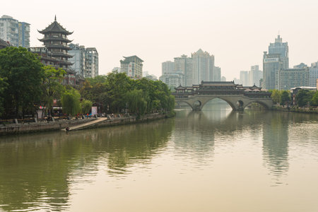 Chengdu, Sichuan Province, China - May 2, 2017: Anshun bridge and JinJiang river in daylight