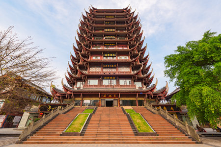 Meishan, Sichuan Province, China - Apr 29, 2017: YuanJingLou building against blue sky and white cloudsのeditorial素材