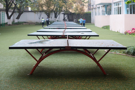 row of table tennis's table in a chinese schoolのeditorial素材