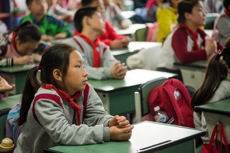 Pupils attend a lesson in a classroomのeditorial素材