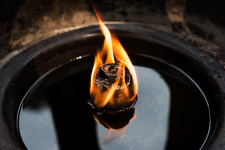 Oil candle in a buddhist templeの写真素材