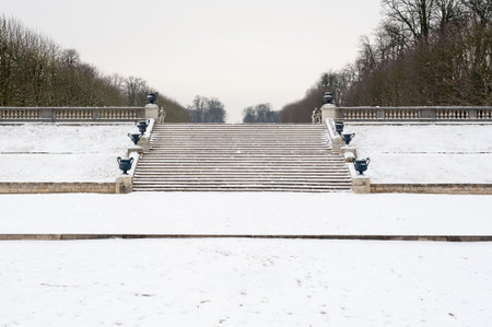Stairs under the snow in Parc de Saint-Cloudの写真素材