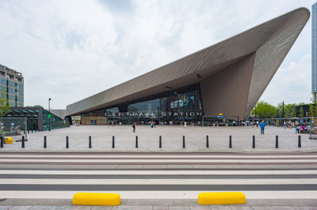 Rotterdam, Netherlands - June 9, 2014: Centraal Station modern building front view with a crosswalk in the foregroundのeditorial素材