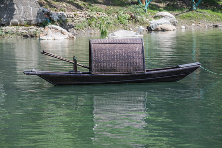 Chinese traditional fishing boat on a lake