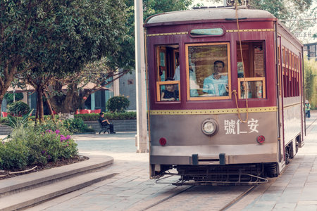 Anren, Sichuan province, China - Aug 26, 2018 : Ancient tramway passing in the street of the old townのeditorial素材