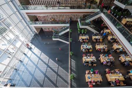 Chengdu, Sichuan province, China - Jan 21, 2016 : People reading in the interior of the Chengdu...