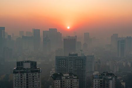 Chengdu, Sichuan province, China - Dec 17, 2015 : Chengdu downtown skyline in the haze aerial view at sunriseのeditorial素材