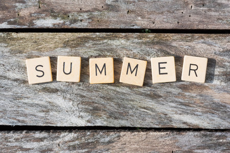 Summer letters on a wood tableの写真素材