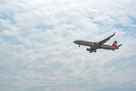 Chengdu airport, Sichuan province, China - August 28, 2019 : Sichuan Airlines Airbus A321 commercial airplane against skyのeditorial素材