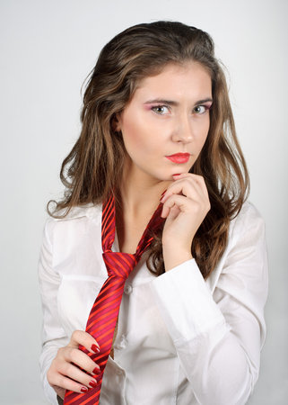 Sexy Woman with Red Tie wearing a white Shirtの写真素材