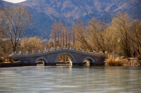 The mountains and trees surrounded by three hole stoneの写真素材
