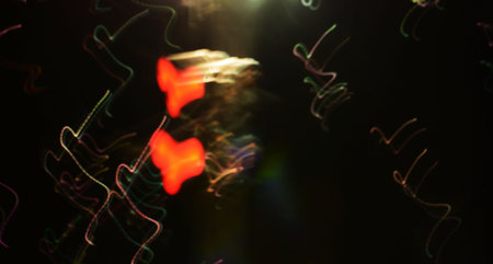 red heart. Long exposure LED lights blur black background