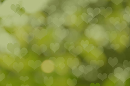 green heart bokeh abstract light backgroundの写真素材