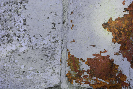 grunge painted old gold and white wall background textureの写真素材