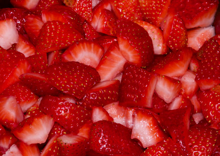 Fresh Cut Strawberries Ready to Eatの写真素材