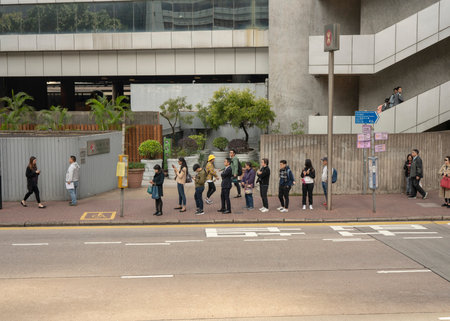 Central, Hongkong, China, 22nd, January, 2019: People waiting in line for the bus.