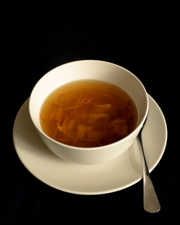 A bowl of chinese traditional nourishing health soup, meat, cordyceps flower.の写真素材
