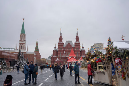 Moscow, Russia, 15th, February, 2019: outdoor festival decoration of Gum Department Store, with State Historical Museum in the background.のeditorial素材