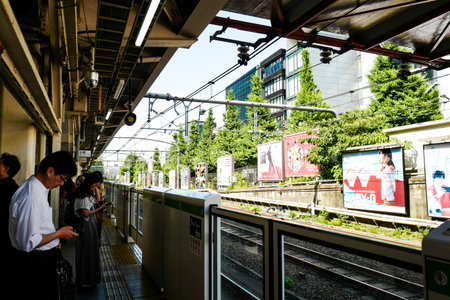Tokyo, Japan, 2rd, June, 2017. Passengers are waiting for the train at the train station.