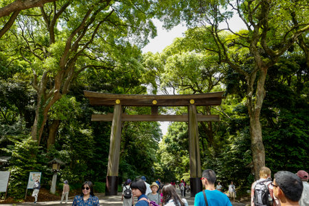Tokyo, Japan, 2rd, June, 2017: Torii leading to the Meiji Shrine complex, located in Shibuya, Tokyo, is the Shinto shrine that is dedicated to the deified spirits of Emperor Meiji and his wife, Empress Shoken.のeditorial素材