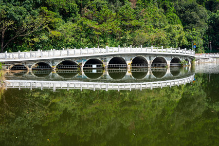 Shenzhen, China. Oct, 2019. The Eleven-Arch Bridge at Fairylake Botanical Garden, or Xianhu Botanical Garden  located at Luohu District, Shenzhen, Guangdong, China.の写真素材