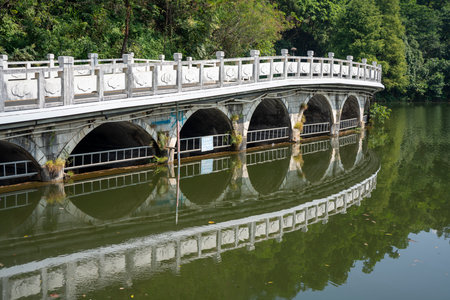 Shenzhen, China. Oct, 2019. The Eleven-Arch Bridge at Fairylake Botanical Garden, or Xianhu Botanical Garden located at Luohu District, Shenzhen, Guangdong, China.のeditorial素材