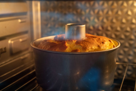 Chiffon cake in the oven.の写真素材