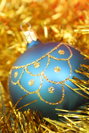 Christmas bauble on a gold decoration.の写真素材