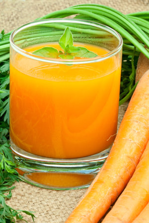 Glass of fresh carrot juice,healthy drink の写真素材