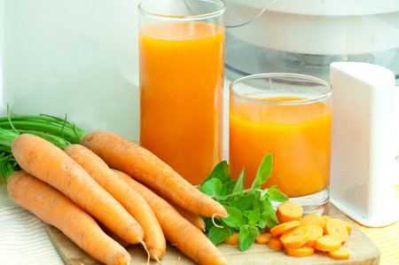 Glass of fresh carrot juice  healthy drink の写真素材