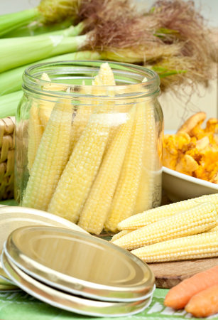 Jar with corn preparing for preserving の写真素材