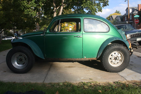 Old customized car parked in a parking spot.の写真素材