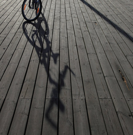 Bike at the pier, jetty in morning seaの写真素材