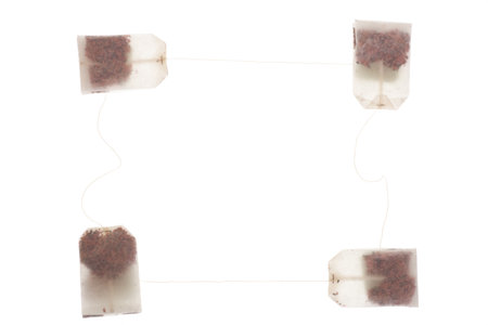 four Lying Teabags - tea-bag isolated on white