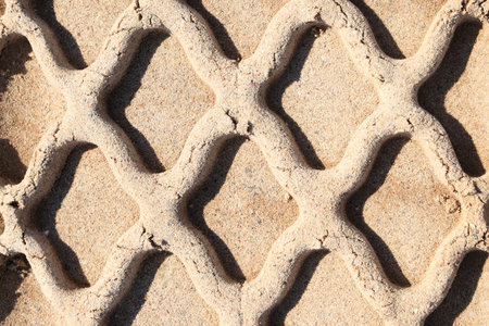 abstract composition for tracks on sand from tire の写真素材