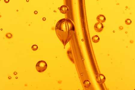 soap bubbles orange liquid backgroundの写真素材