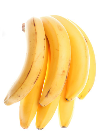 yellow bunch bananas isolated on white background の写真素材