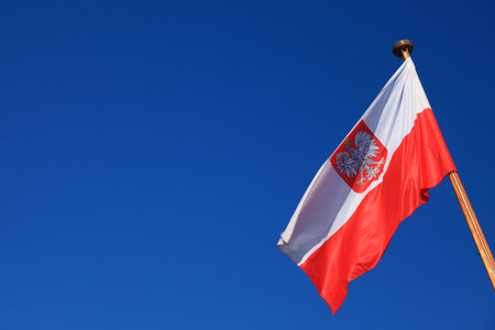 Flag of Poland on blue skyの写真素材
