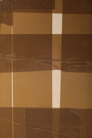 Side of Cardboard Box with Tapeの写真素材