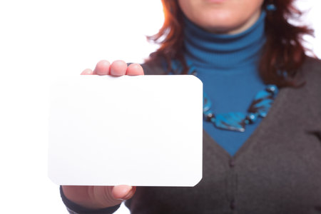 Blank of business card in woman handの写真素材