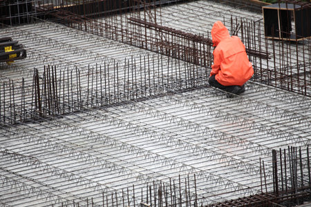 man, worker in construction building