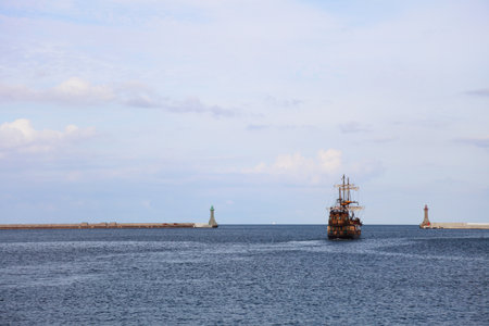 old ship  lighthouse lamp post breakwater wharf, quay - Gdynia, Poland port detailの写真素材