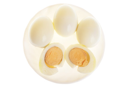 scrambled eggs on plate isolated on white background の写真素材