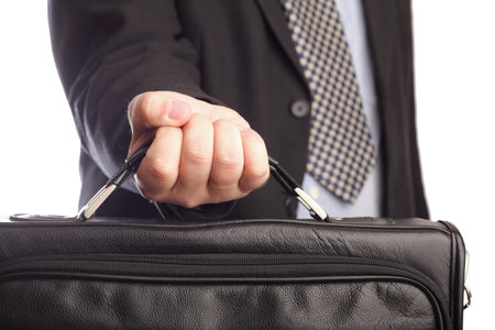 black holding a briefcase in man hand - isolated on whiteの写真素材