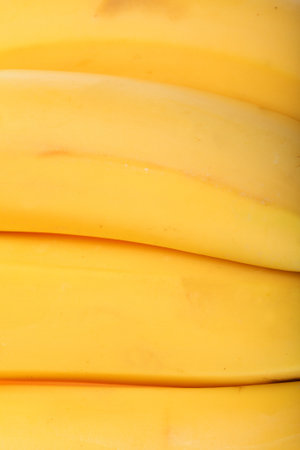 yellow bunch bananas background textureの写真素材