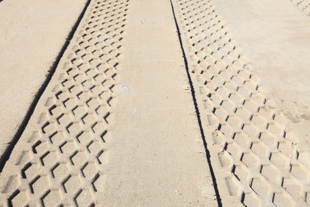 abstract composition for tracks on sand from tire 