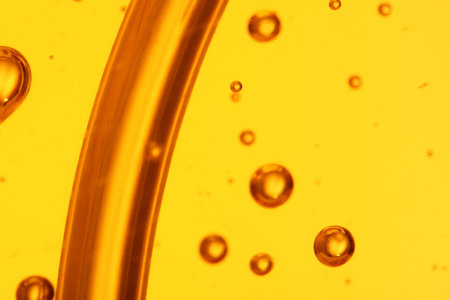 soap bubbles orange liquid backgroundの写真素材