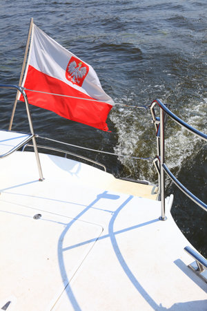 Poland Polish Ensign Flag on the stern of a classic yachtの写真素材